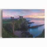 Stretched canvas artwork depicting a serene landscape with a majestic castle surrounded by lush greenery and a clear blue sky, ideal for home decor.