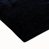 Close-up of a stretched canvas artwork depicting intricate landscapes and cave formations, showcasing vibrant earthy tones and detailed textures, perfect for home decor.