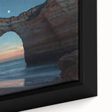 Close-up of a framed canvas depicting a vibrant landscape with dramatic cliffs and lush greenery, ideal for home decor and nature enthusiasts. The artwork features rich colors and intricate details, enhancing any living space's ambiance.