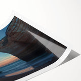 Vibrant rolled print of a coastal landscape featuring dramatic cliffs and a sunset, showcasing rich colors and intricate textures, ideal for home decor.