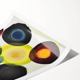 Abstract geometric design rolled canvas print featuring vibrant colors and intricate patterns, packaged securely in a sturdy cardboard tube for safe delivery.