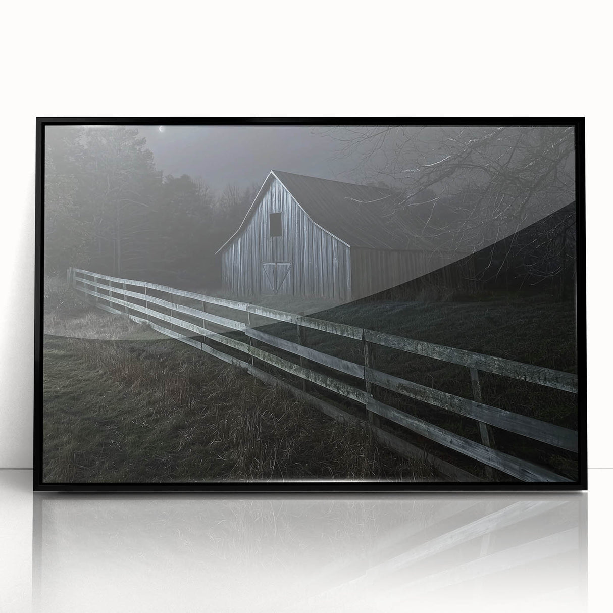 Black-framed acrylic artwork showcasing a serene landscape scene of a barn surrounded by lush greenery, perfect for home décor and rustic-themed interiors.