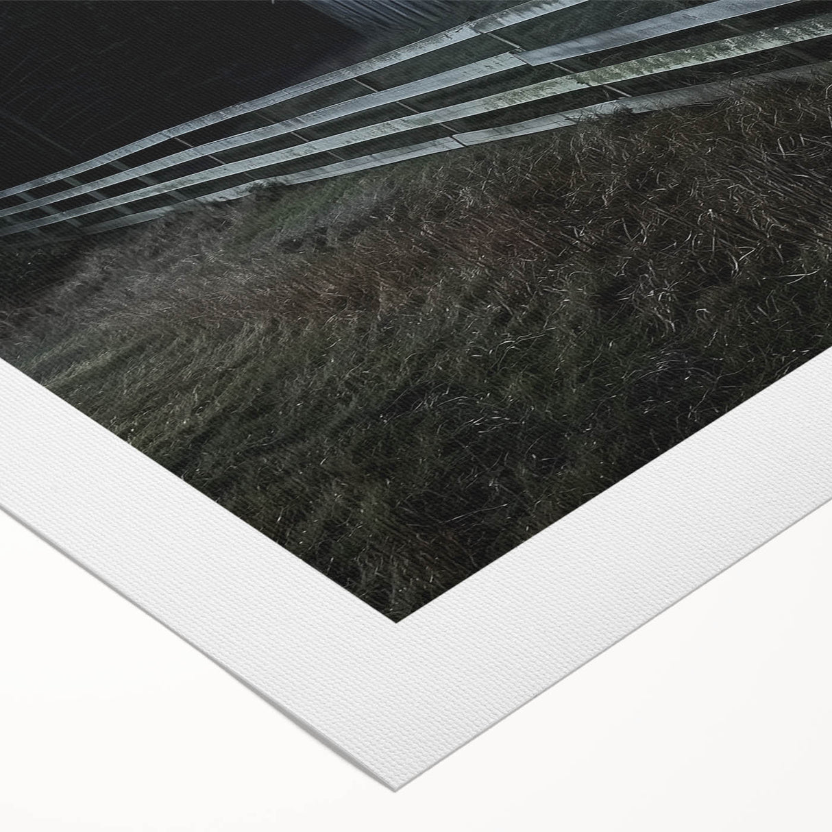 Rolled canvas displaying a vibrant landscape barn design, showcasing rich colors and intricate details, securely packaged in a durable cardboard tube for safe shipping.