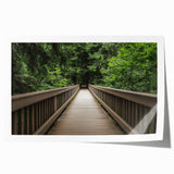 Rolled canvas print showcasing a vibrant landscape bridge design, featuring rich colors and intricate details, securely packaged in a protective cardboard tube for easy transport and display.
