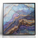 Framed acrylic artwork of a dramatic canyon landscape, showcasing vibrant earth tones and intricate details, perfect for enhancing modern home decor.