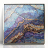 Framed acrylic artwork showcasing a stunning landscape of canyons in vibrant colors, featuring a sleek silver frame ideal for modern home decor.