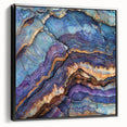 Framed canvas artwork showcasing a stunning landscape of colorful canyons, black frame accentuating the vibrant hues, ideal for modern home decor.