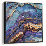 Framed canvas artwork showcasing a stunning landscape of colorful canyons, black frame accentuating the vibrant hues, ideal for modern home decor.