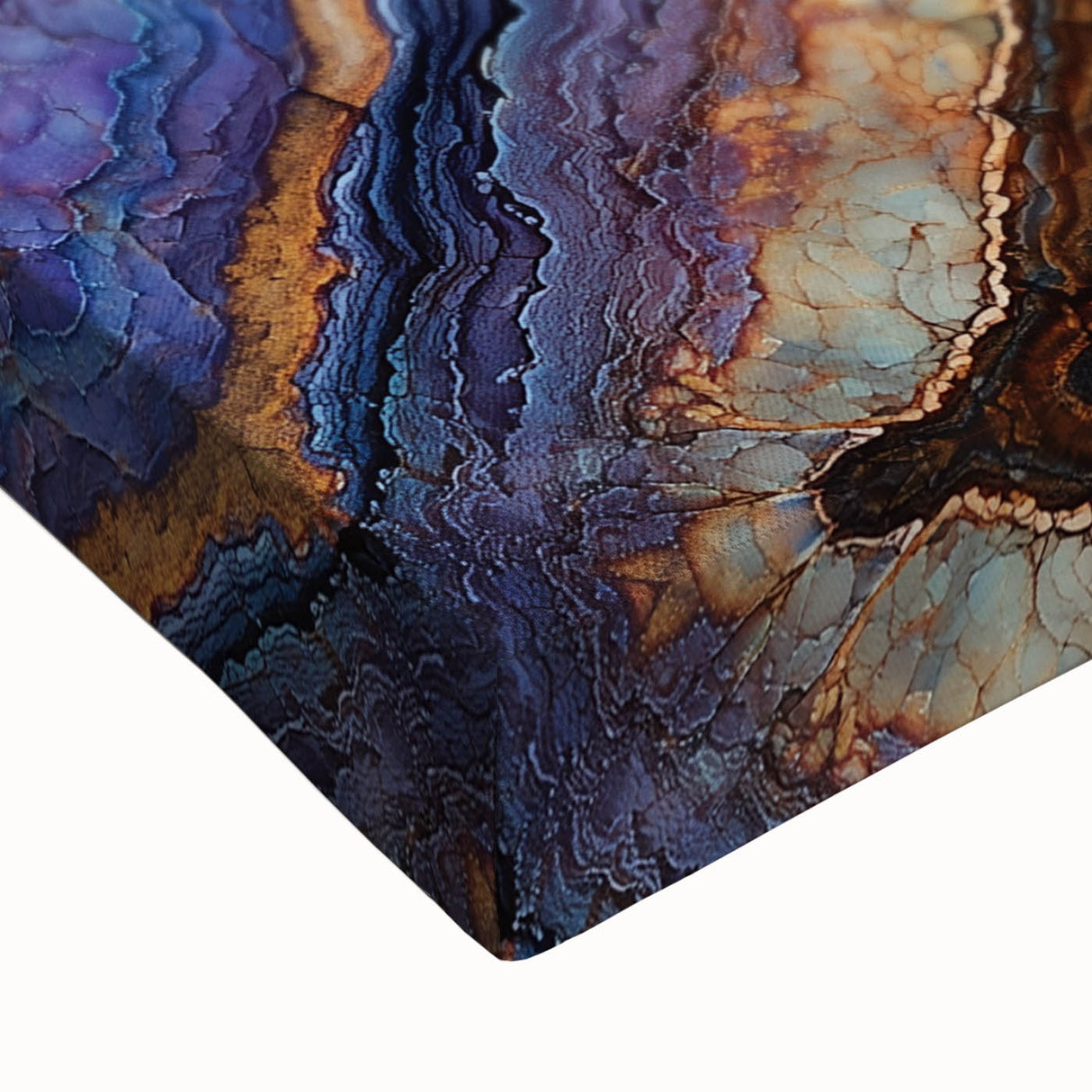 Close-up of a textured stretched canvas depicting a vibrant landscape of colorful canyons, showcasing rich earth tones and intricate details, perfect for home decor.
