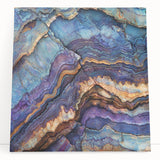 Stretched canvas artwork showcasing a vibrant landscape of canyons, featuring rich earthy tones and dramatic rock formations, perfect for home decor.