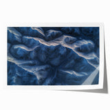 Vibrant rolled print showcasing a stunning desert landscape with soft, warm colors and intricate details, ideal for home decor and art enthusiasts.