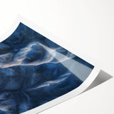 Desert landscape rolled canvas print showcasing vibrant hues of orange and yellow, featuring intricate details of sand dunes and a clear blue sky, elegantly packaged in a protective cardboard tube.