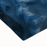 Close-up of a stretched canvas depicting a vibrant desert landscape, showcasing warm earth tones and intricate details of the arid scenery, ideal for home decor.