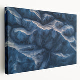 Stretched canvas artwork showcasing a vibrant desert landscape with warm hues of orange and yellow, ideal for home decor. Perfect for enhancing modern interiors.