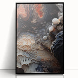 Large abstract wall art print in muted earth tones, framed in black acrylic, suitable for modern living room decor.