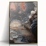 Large art print of natural elements in gold tones on acrylic, framed, in mid-century modernist style.