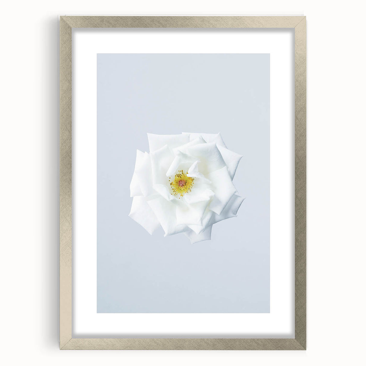 Textured art depicting abstract spring themes in soft green and white hues on a silver framed canvas.