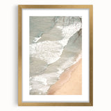 Extra large abstract art print with textured swirls in warm orange and gold tones, framed in gold.