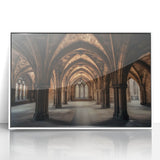 Framed acrylic print of a serene landscape featuring a majestic castle surrounded by lush greenery, set against a clear blue sky; elegant white frame enhances its charm.