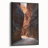 Framed canvas artwork showcasing a serene landscape with caves, featuring a black side view, ideal for modern home decor and wall aesthetics.
