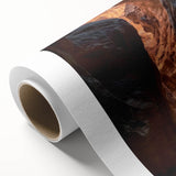 Rolled canvas artwork depicting a vibrant landscape with intricate cave formations, showcasing earthy tones and textures, designed for home decor and wall display.