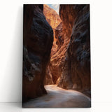 Stretched canvas artwork showcasing an abstract landscape with vibrant colors and cave-like formations, leaning against a wall for display.