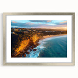 Framed landscape artwork showcasing dramatic cliffs in a silver mat, perfect for home decor, with a modern aesthetic and elegant presentation. Ideal for nature lovers.