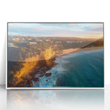 Framed acrylic artwork showcasing a dramatic cliff landscape in vibrant colors, set in a sleek white frame, perfect for modern home decor. Ideal for nature lovers.