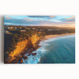 Vibrant stretched canvas artwork depicting dramatic cliffs against a serene landscape, showcasing rich colors and textures, perfect for home decor.