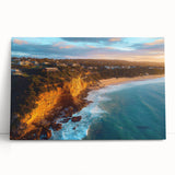 Stretched canvas artwork depicting a serene landscape with dramatic cliffs and lush greenery, ideal for enhancing home decor with natural beauty.