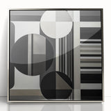 Framed abstract geometric artwork in silver, showcasing intricate shapes and patterns, ideal for modern home decor. Adds elegance and sophistication to any space.