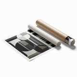 Abstract geometric rolled print showcasing vibrant colors and intricate patterns, elegantly displayed in a sturdy cardboard tube for safe transport. Perfect for modern home decor.