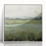 Framed abstract landscape wall art featuring vibrant hues of blue, green, and orange, set in a sleek white frame, perfect for modern home decor.