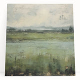 Abstract landscape wall art on stretched canvas showcasing vibrant colors and fluid forms, perfect for modern home decor. This piece leans against a neutral wall, highlighting its artistic flair and contemporary style.