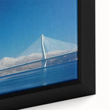 Close-up of a framed canvas artwork depicting a serene landscape bridge scene, showcasing vibrant colors and intricate details, perfect for home decor.