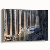 Framed canvas art showcasing a stunning landscape of canyons with rich earth tones and silver accents, perfect for enhancing modern home decor.