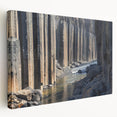 Stretched canvas artwork depicting a stunning landscape of canyons in warm earth tones, showcasing intricate details and textures, perfect for home decor.