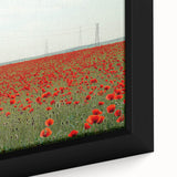 Close-up of a framed canvas showcasing a serene countryside landscape, featuring vibrant green fields, a clear blue sky, and gentle hills, perfect for home decor.