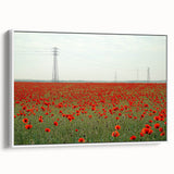 Framed canvas artwork depicting a serene countryside landscape, showcasing vibrant green fields and rolling hills, presented in a stylish white frame for home decor.