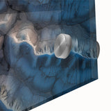 Close-up of vibrant desert landscape artwork printed on acrylic glass, showcasing warm colors and intricate textures, perfect for modern home decor.