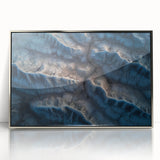 Framed acrylic artwork depicting a serene desert landscape in shades of gold and orange, perfect for home or office decor, enhancing any interior space.