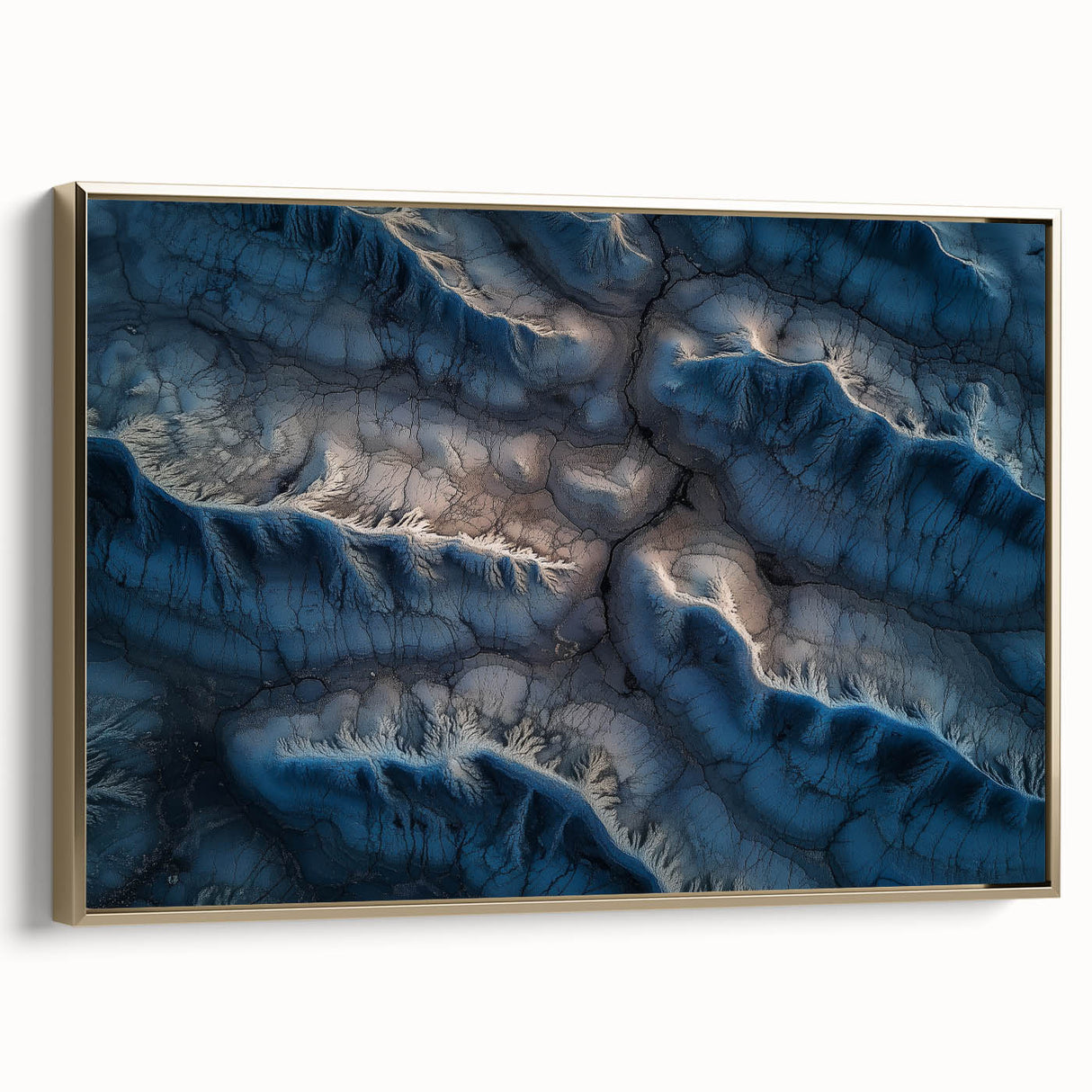 Framed canvas artwork showcasing a stunning desert landscape with warm gold accents, elegantly displayed in a sleek frame, perfect for modern home decor.