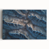 Stretched canvas artwork depicting vibrant desert landscapes with orange and yellow hues, showcasing a serene sunset over rolling sand dunes. Ideal for home decor.