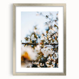 Textured abstract art print in soft pastel shades on a framed silver canvas, ideal for bedroom ambiance.