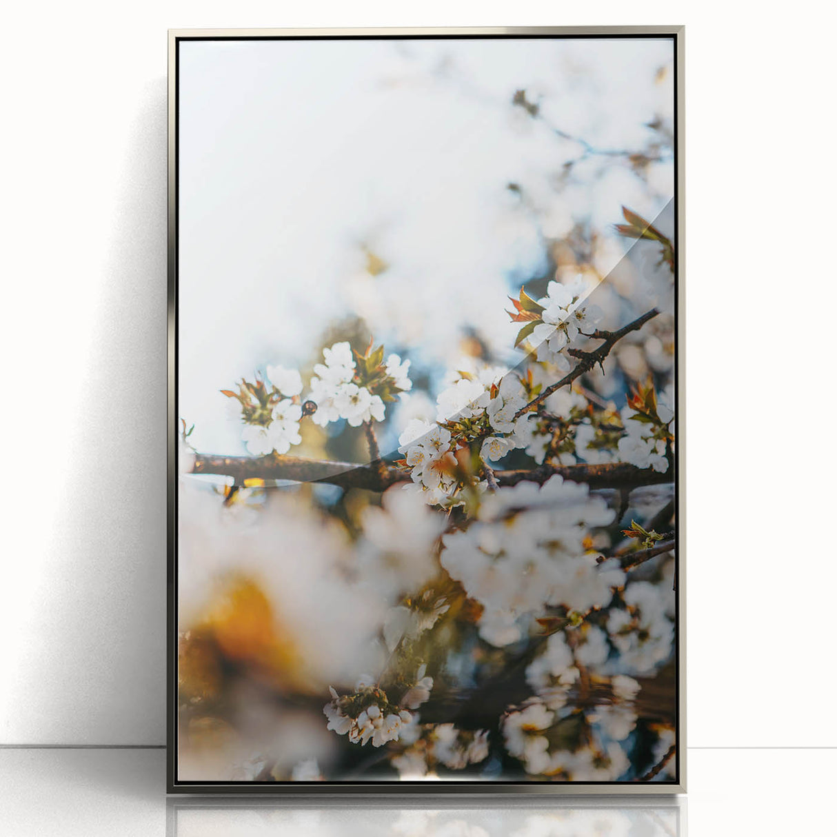 Mid-century modernist art depicting spring season in muted green and pink tones on a framed acrylic.