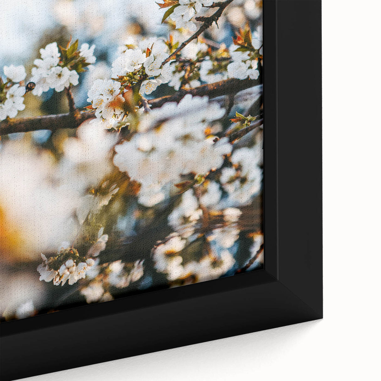 Black wall art featuring a textured spring scene with vibrant colors on a framed canvas, ideal for living room decor.