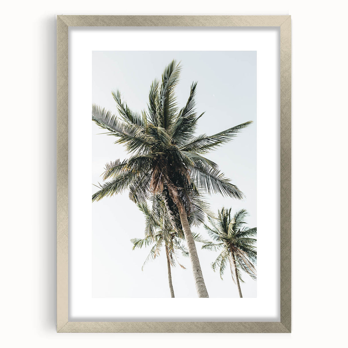 Textured abstract art print in warm orange and yellow hues, framed in silver, ideal for bedroom wall decor.