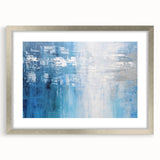 Abstract wall art featuring bold, colorful strokes framed in silver with a white mat, ideal for modern decor and enhancing living spaces.