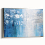 Abstract wall art featuring multicolored strokes on a framed canvas with a sleek silver border, showcasing a modern design ideal for contemporary decor.
