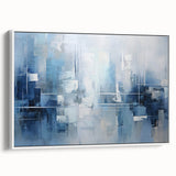 Framed canvas wall art featuring abstract strokes in shades of blue, gray, and white, showcasing a modern design that adds elegance to any room decor.